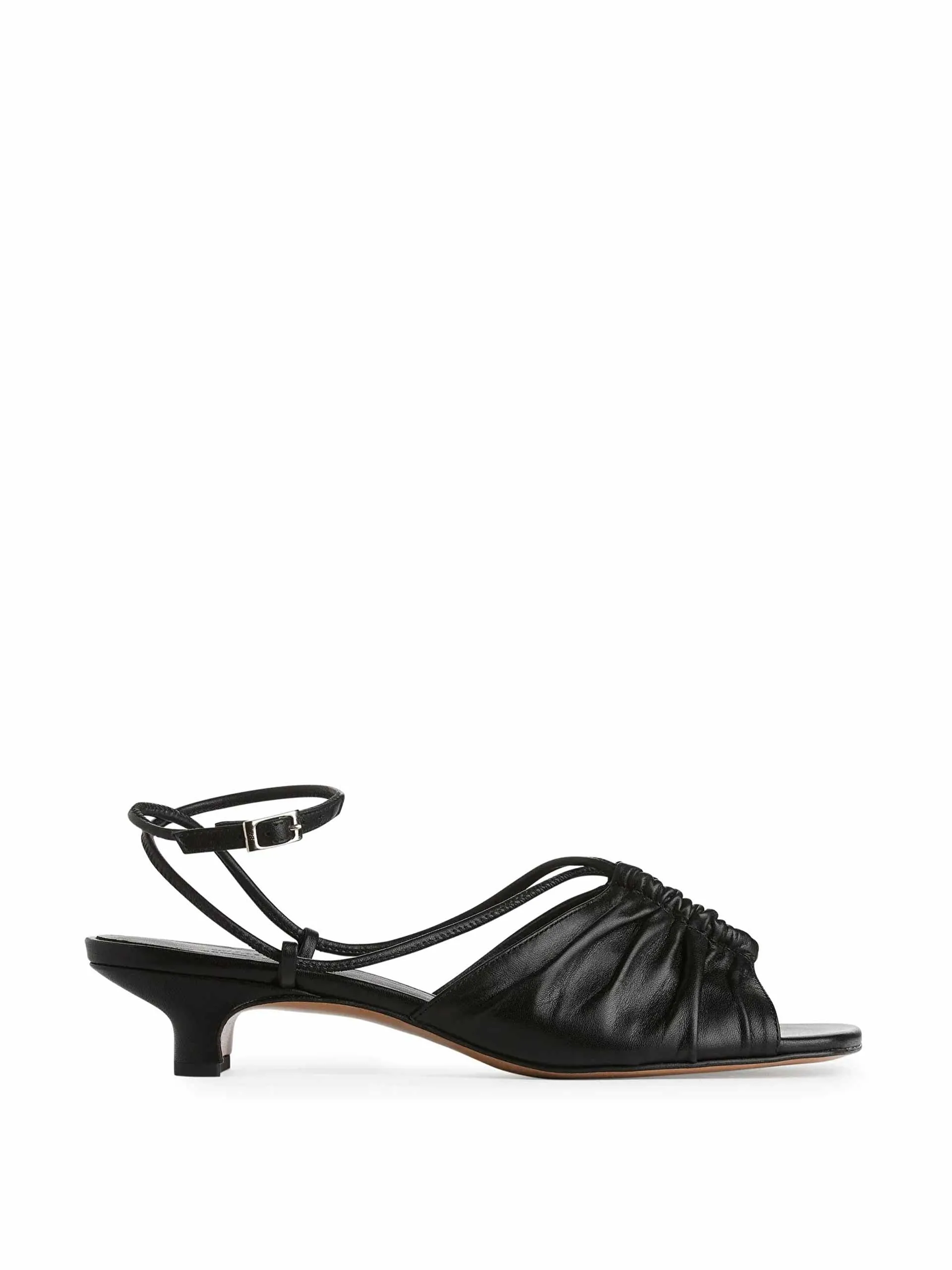 Heeled black leather sandals