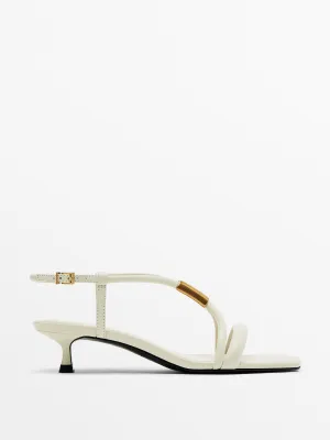 High heel sandals with metal piece